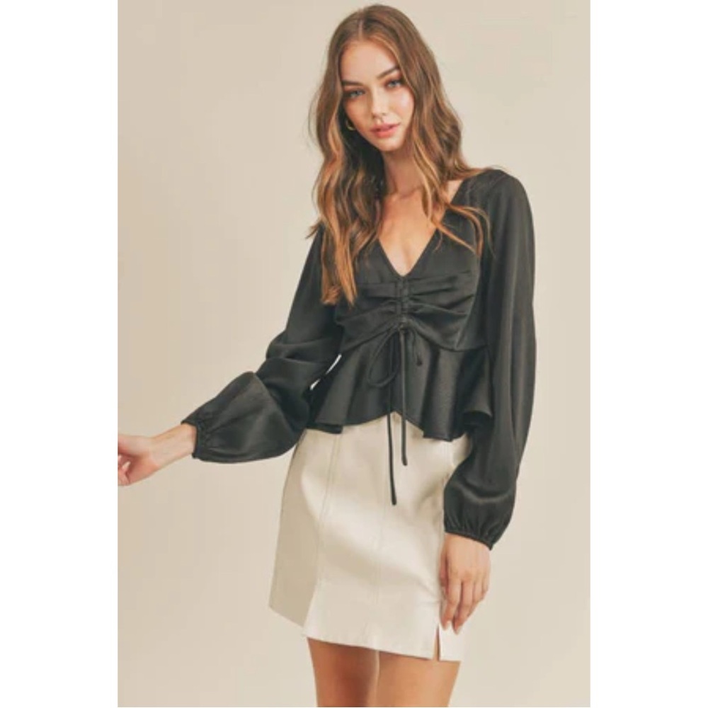 black "All in Favor Tie Front Satin Peplum Top" with a V-neck and long sleeves. - Picture 2 of 6